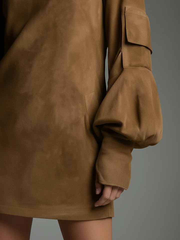 Louise Vintage Turtleneck Mini Dress, detail of the balloon sleeve with flap pocket