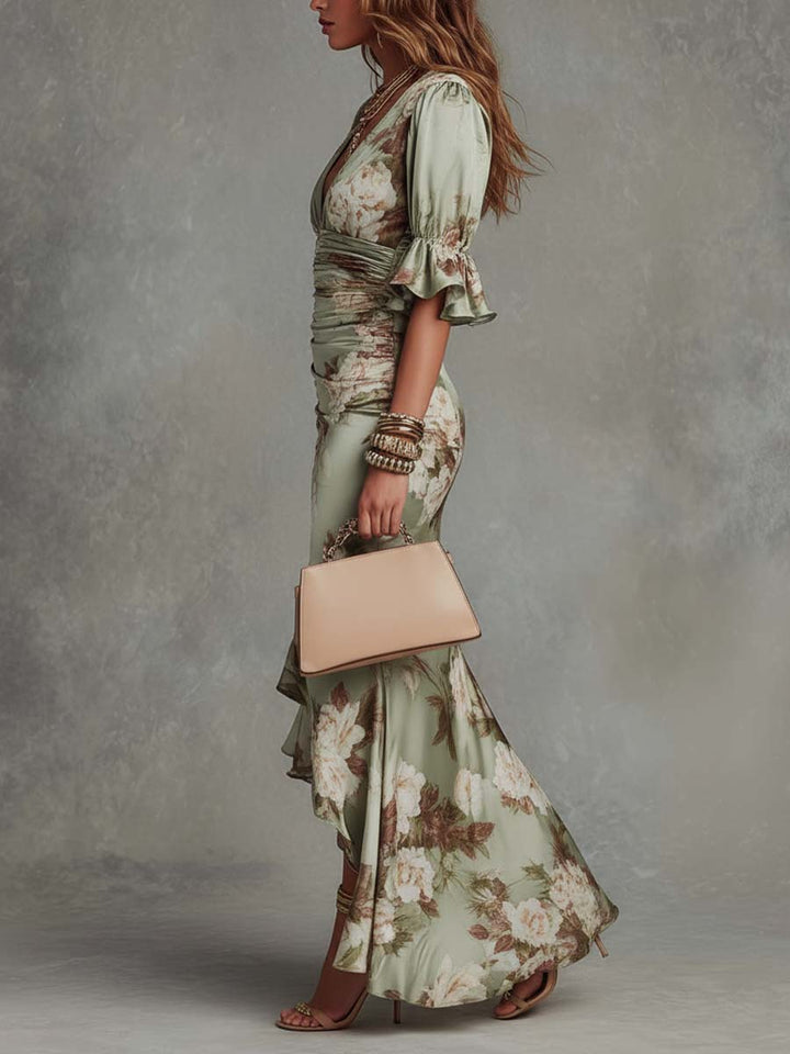 Anna | Asymmetrical long dress in green satin with V-neck, flared puff sleeves, and floral pattern