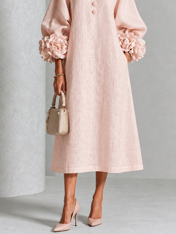 Liana dress in blush, detail of the petal buttons