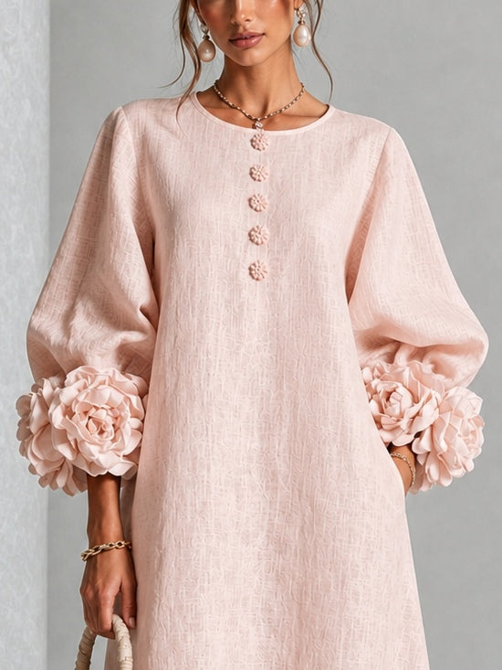 Liana dress in blush, close view of the rosette cuff